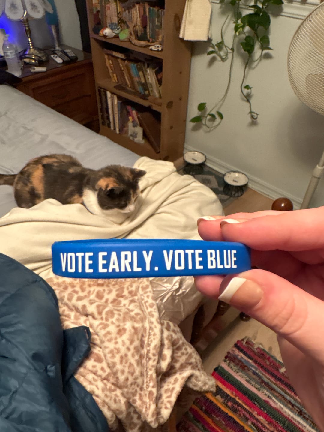 Customer photo review of Vote Early Vote Blue Silicone Wristband – QR Code Edition