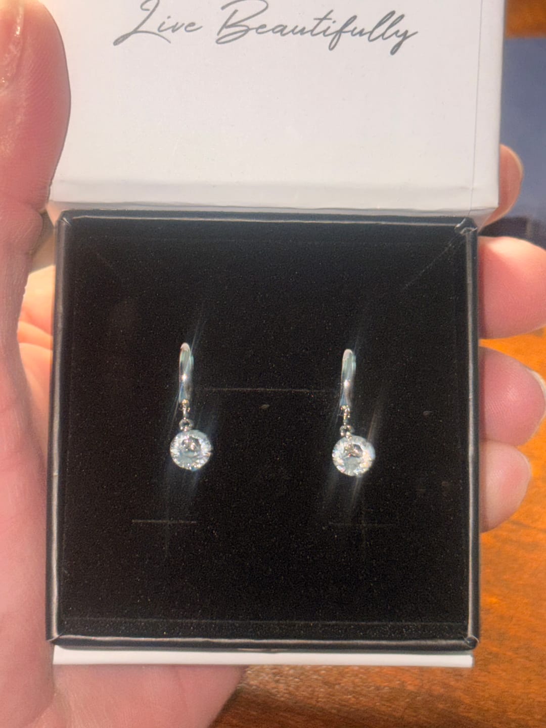 Customer photo review of Georgia 18k White Gold Plated 14mm Hoop Dangle Earrings with Swarovski Crystals