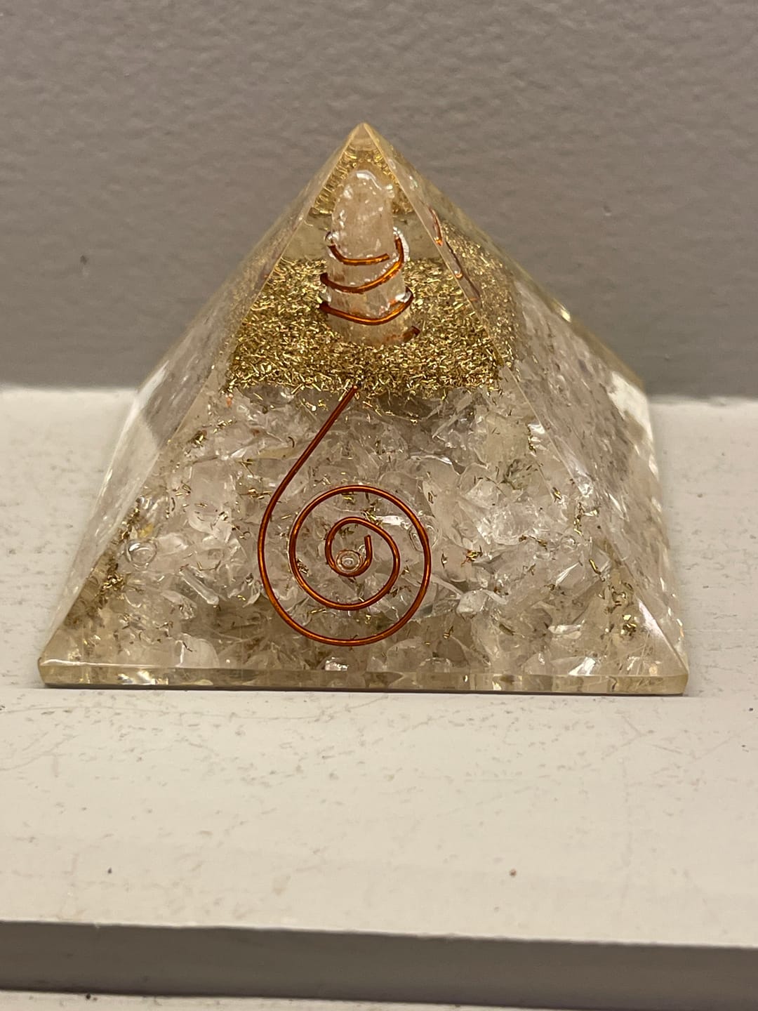 Customer photo review of Natural Selenite Crystal Pyramid Vastu Remedy for Energy Cleansing, Crystal Charging, Crown Chakra Healing and Space Purification for Meditation, Reiki and Home Decor | 6.5 cm | 100  gm