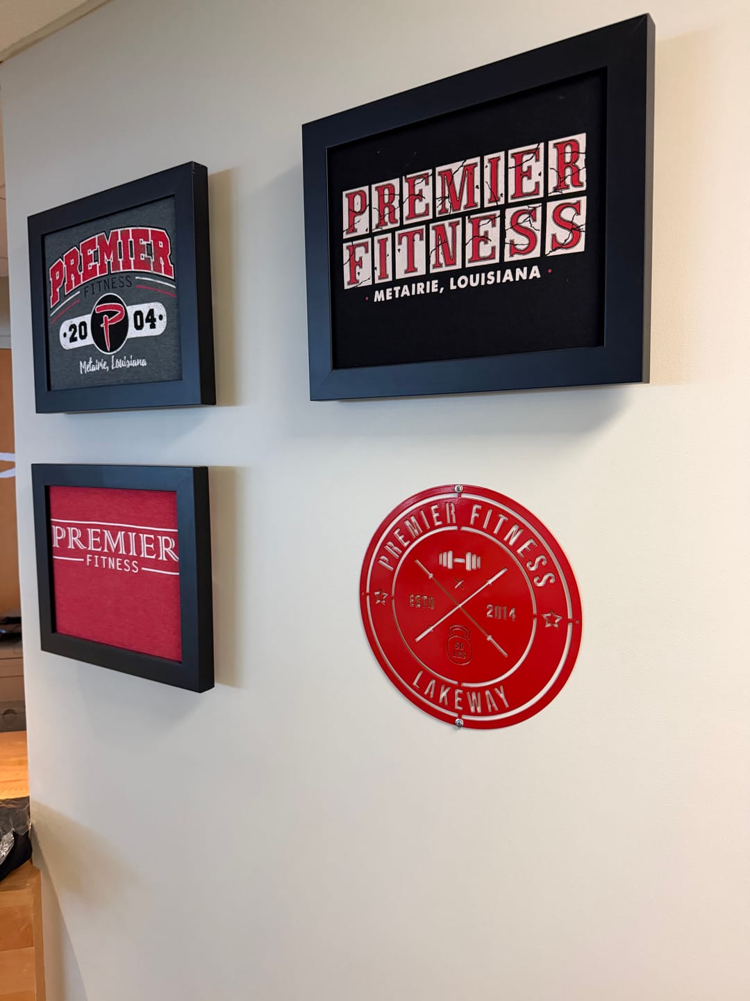 Customer photo review of Crossed Barbell Gym Sign