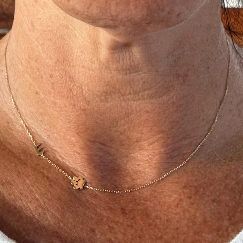 Customer photo review of 14K Gold Sideways Paw Initial Necklace