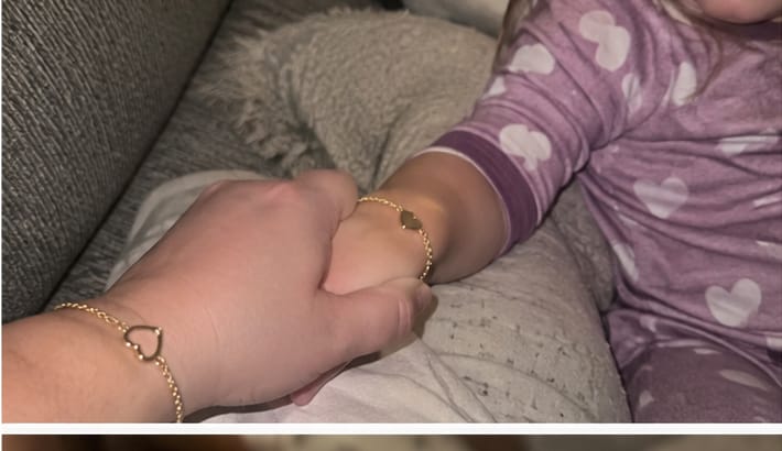 Customer photo review of זוג צמידי לב