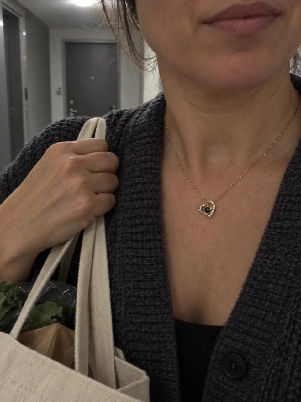 Customer photo review of שרשרת לב עם תמונה חבויה
