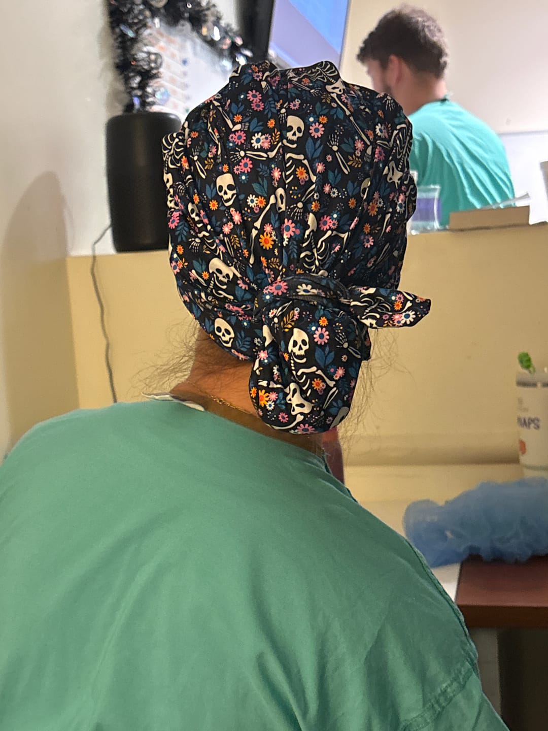 Customer photo review of CloudCaps Scrub Cap | Skeleton Flowers