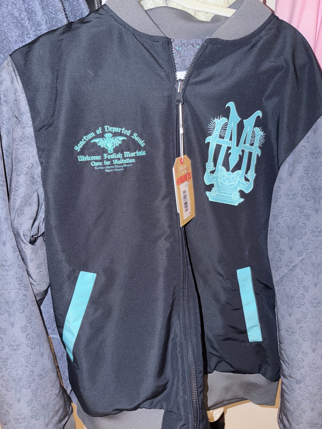 Customer photo review of Disney's Haunted Mansion "Welcome Foolish Mortals (East)" – Reversible Bomber Jacket