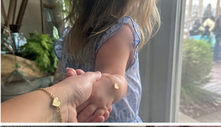 Customer photo review of זוג צמידי לב
