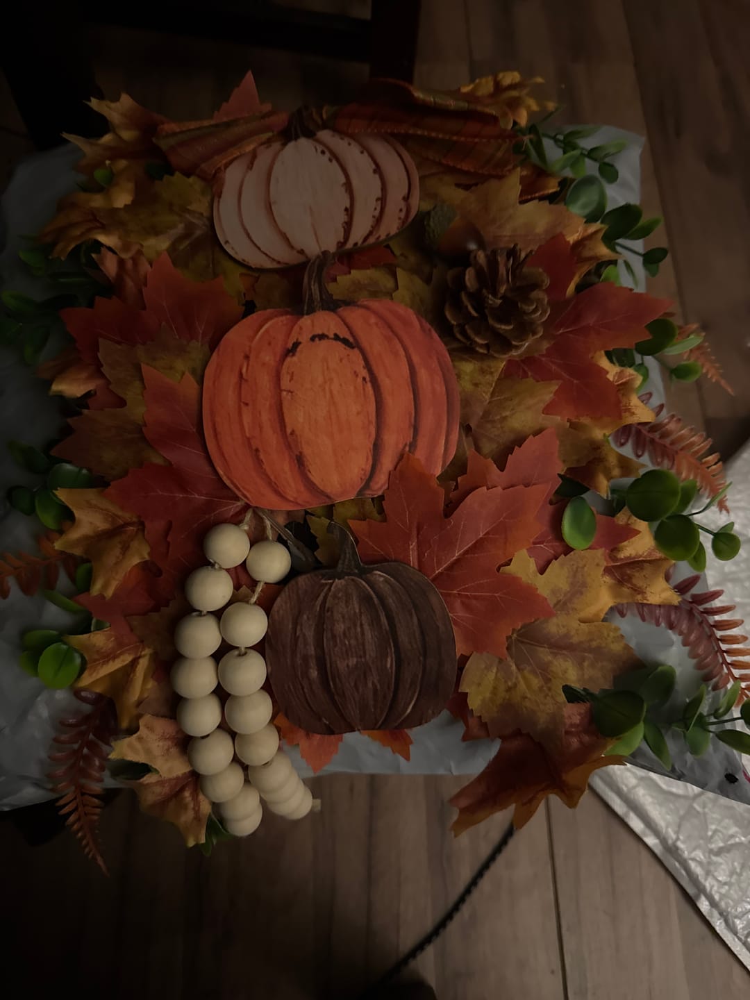Customer photo review of 🏡🎃Rustic Wooden Pumpkin Door Hanging with Warm LED Lights