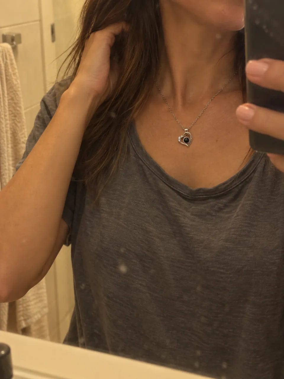 Customer photo review of שרשרת לב עם תמונה חבויה