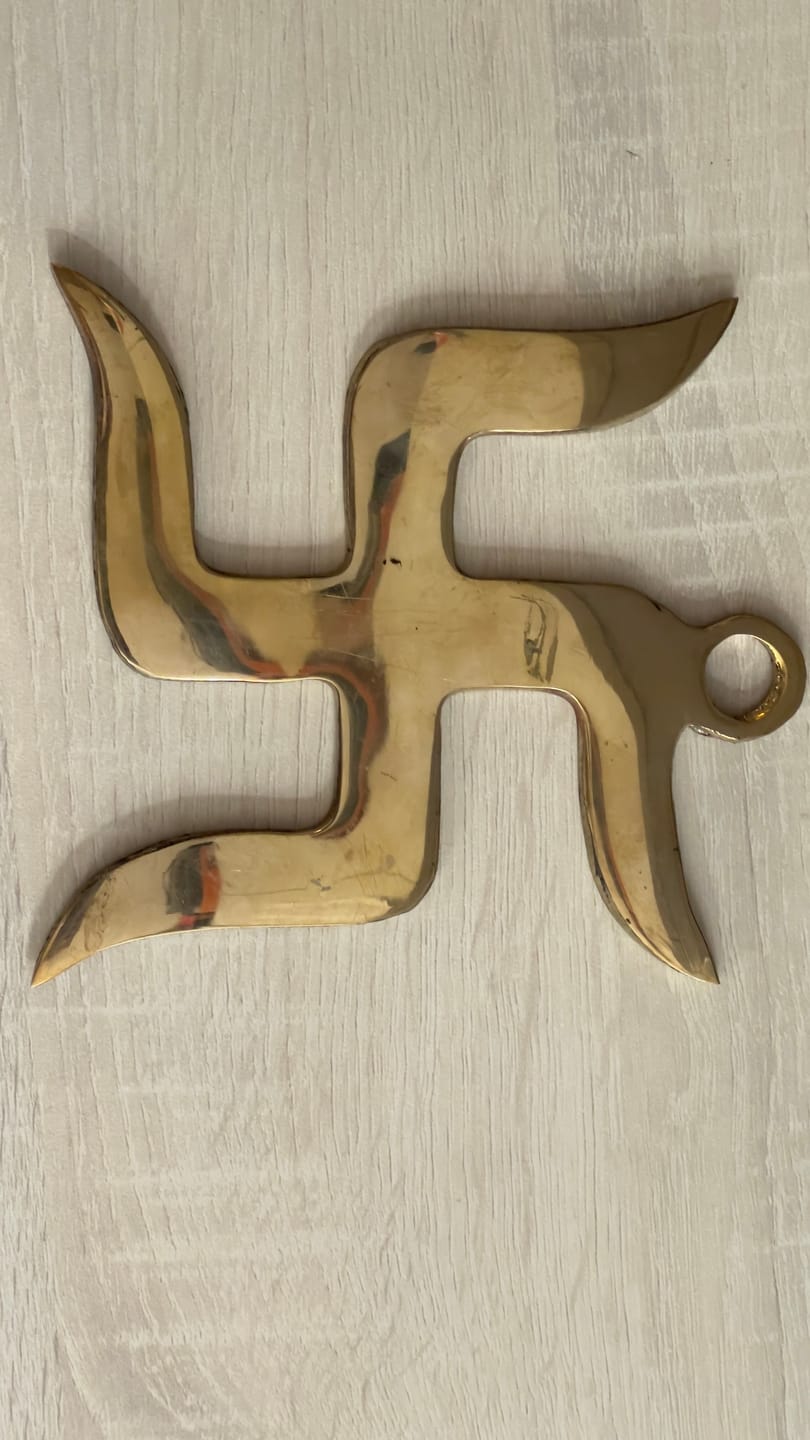 Customer photo review of Brass Swastik Wall Symbol | Vastu Remedy for Main Entrance & Auspicious Energy | 5 & 9 Inch
