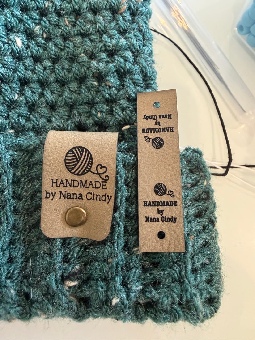 Customer photo review of Custom Faux Leather Tags - Sew-On Rectangle Labels - 2 x 0.5 Inch for Handmade Projects