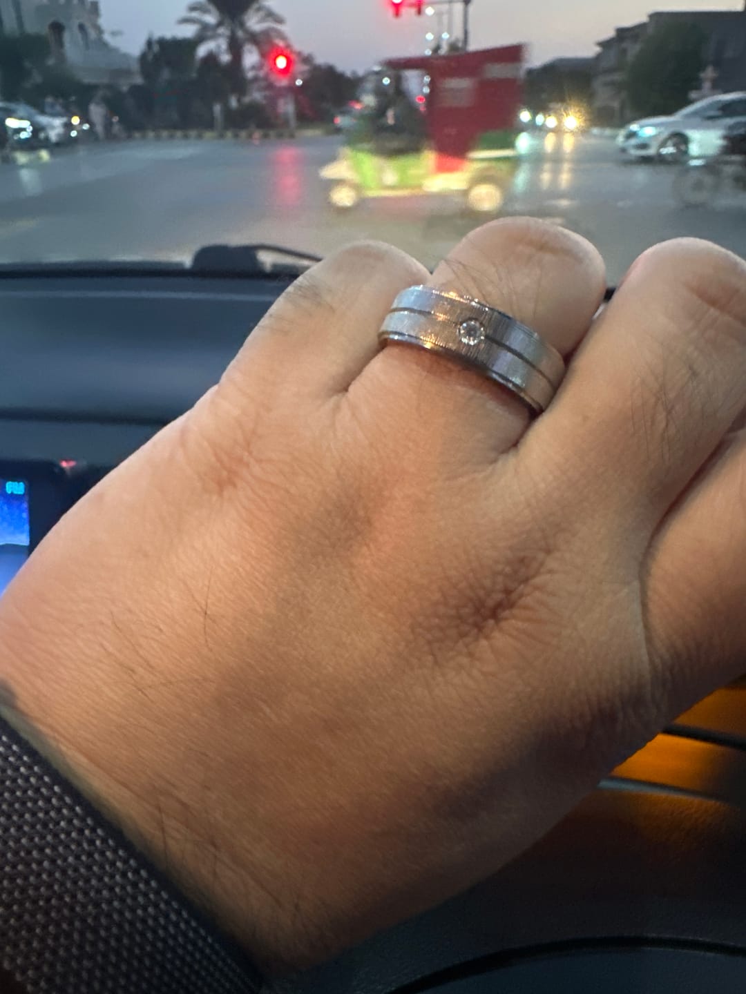 Customer photo review of Band of Devotion — Men's Moissanite Wedding Band in Sterling Silver