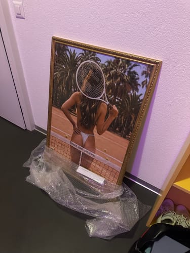 Customer's Peace Over Pressure art print in a gold frame, still in protective plastic packaging.