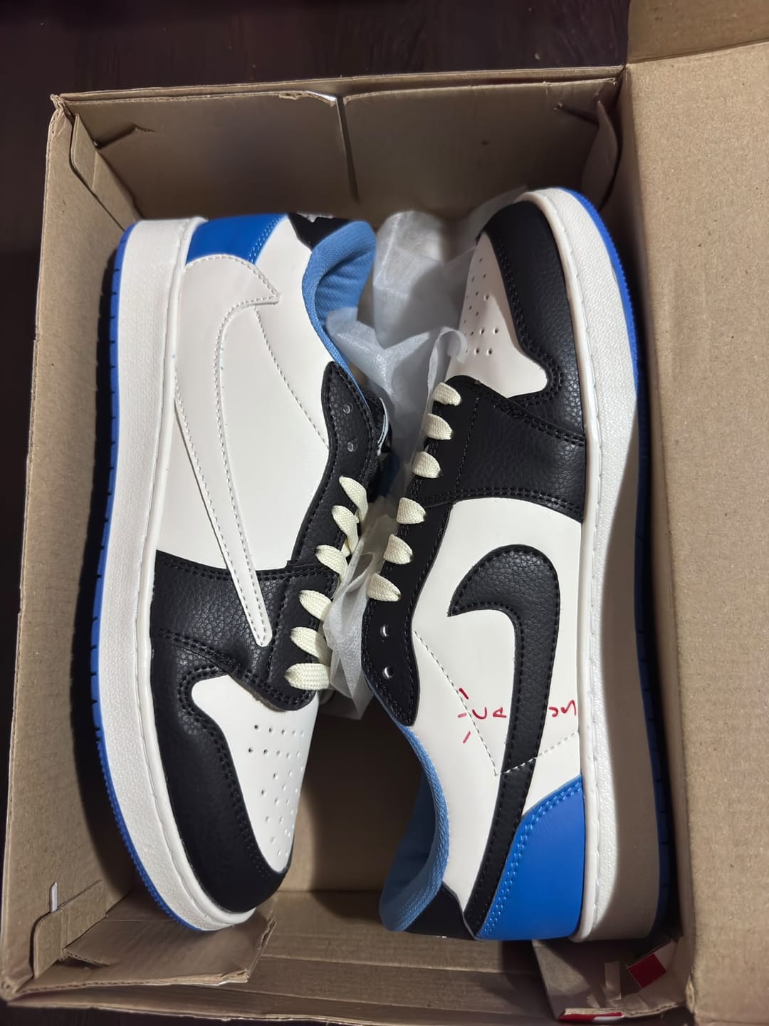 Customer photo review of Tenis Travis Low OG Fragment X