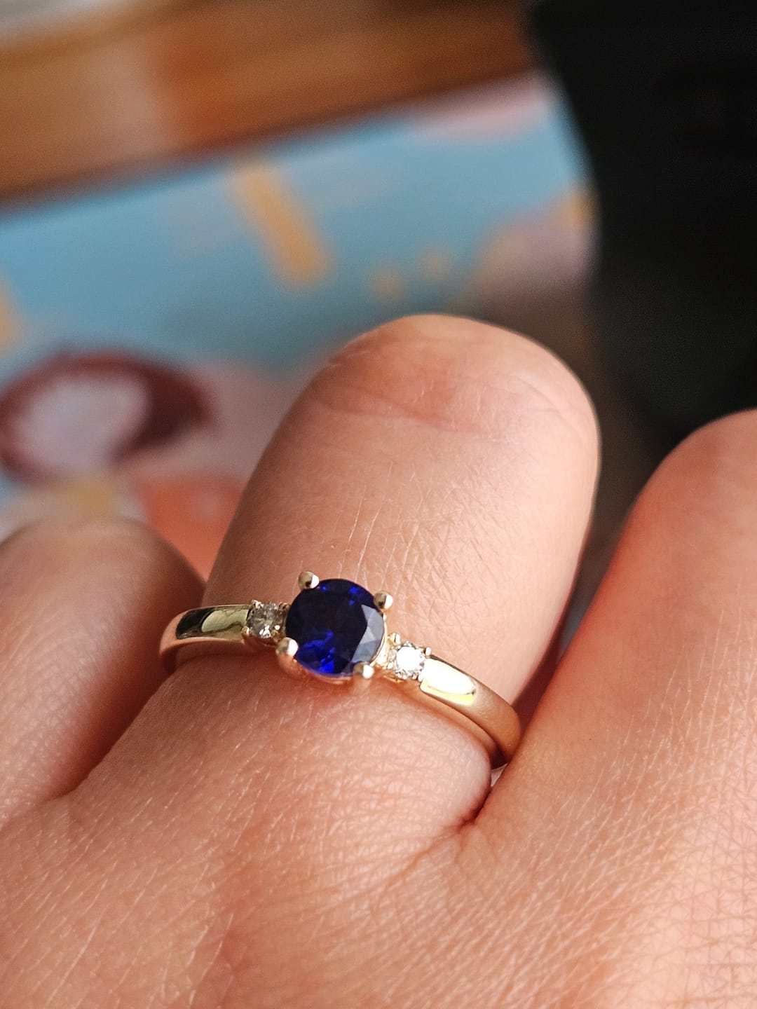 Customer photo review of Created Sapphire & Diamond Trilogy Ring in 9ct Yellow Gold