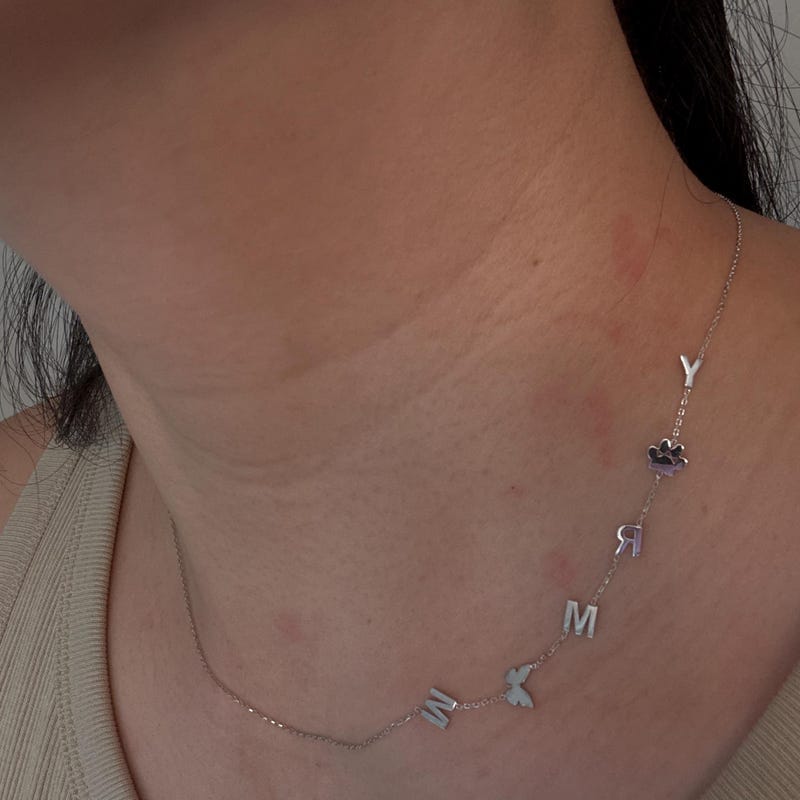 Customer photo review of 14K Gold Sideways Paw Initial Necklace