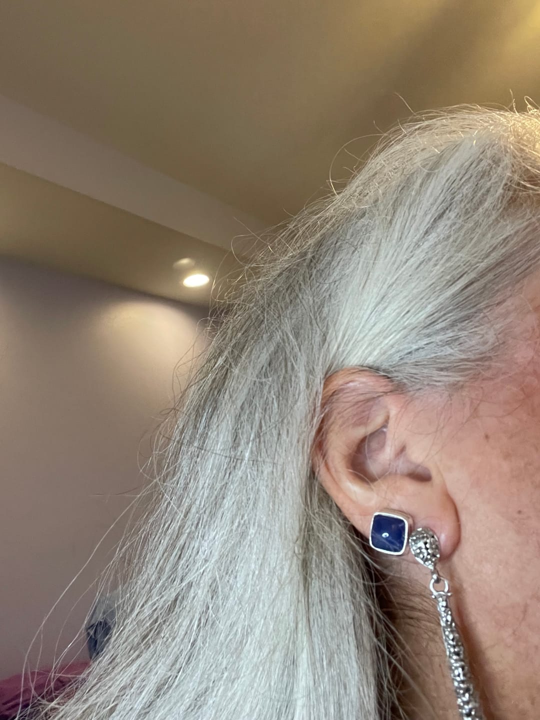 Customer photo review of Premium Tanzanite Earrings 1/2" (.925 Sterling Silver)