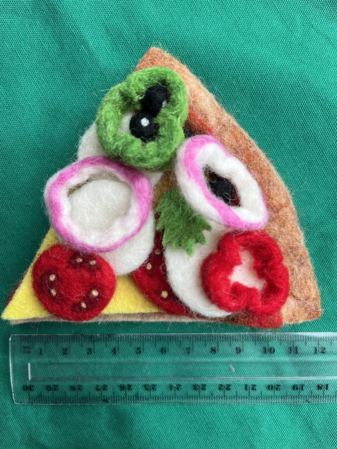 Customer photo review of Felt Mediterranean Pizza Slice