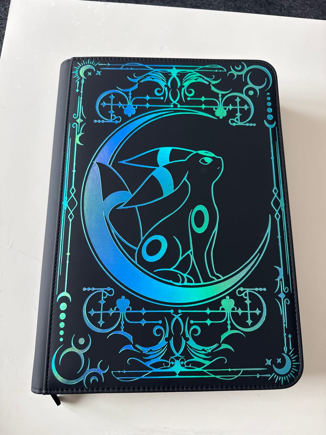 Customer photo review of Lunar Shadow Shiny 9-Pocket Trading Card Binder
