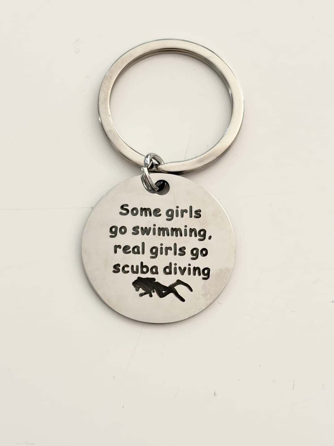 Customer photo review of Cool Stainless Steel Keychain: Some girls go swimming, real girls go Scuba Diving