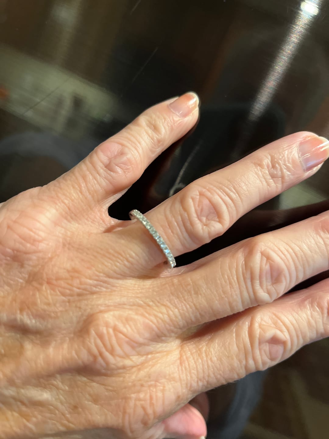 Customer photo review of Moissanite Round Half Eternity Sterling Silver Wedding Band Stackable Ring