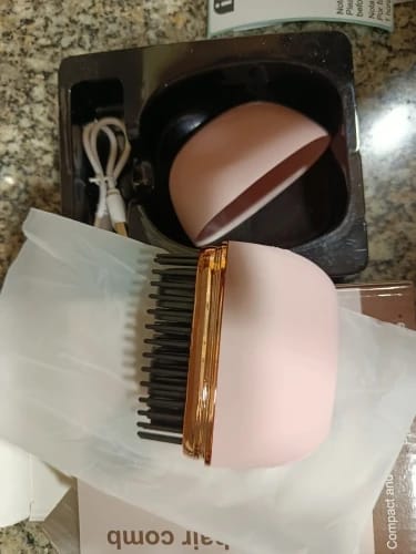Customer photo review of Mini cepillo de pelo inalámbrico