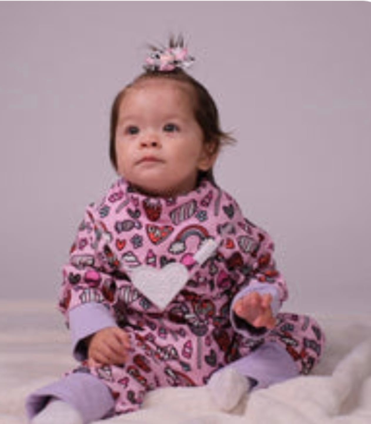 Customer photo review of Grá Onesie