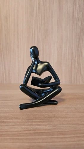 Customer photo review of Abstract Little Man Reading Book Sculpture