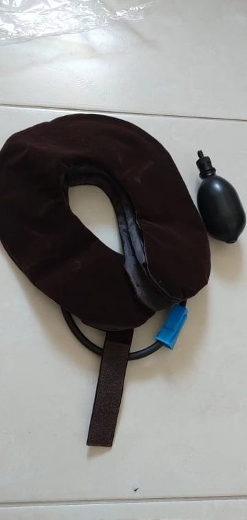 Customer photo review of Dispositivo inflable de traccion cervical para estirar el cuello