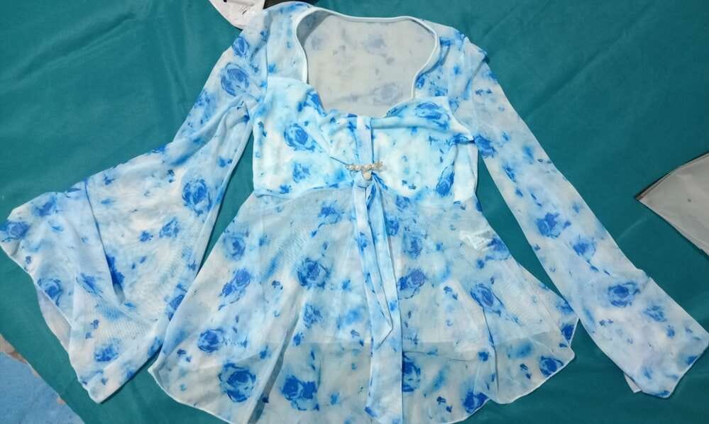 Customer photo review of Ninonine "Elowen" | Floral Mesh Bow-Front Peplum Top