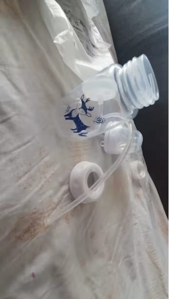 Customer photo review of Biberón Manos Libres Anti-Cólicos 240ML