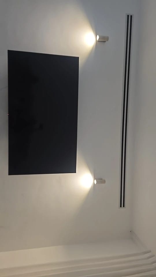 Customer photo review of Wabi-Sabi Travertine Wall Lamp