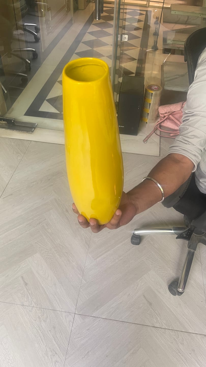Customer photo review of Yellow Resin Vase Sculpture Vastu Remedy for Financial Stability, and Expenditure Control for SSW Direction Placement in Home, Office and Living Spaces | 8 x 37 cm | 600 gm