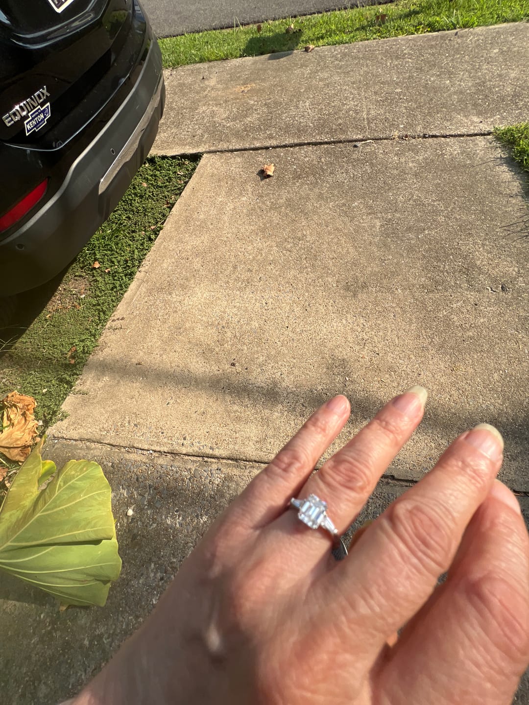 Customer photo review of Three Stone Emerald Cut Moissanite Tapered Baguette Engagement Ring