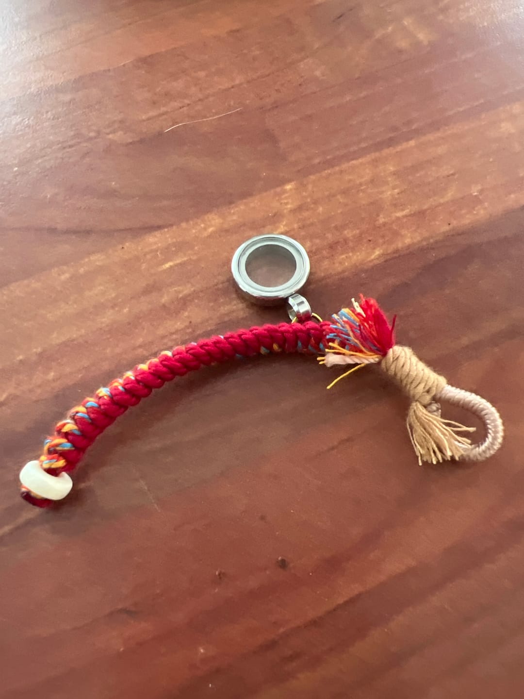 Customer photo review of Compassion Mandala Sand Blessing Charm