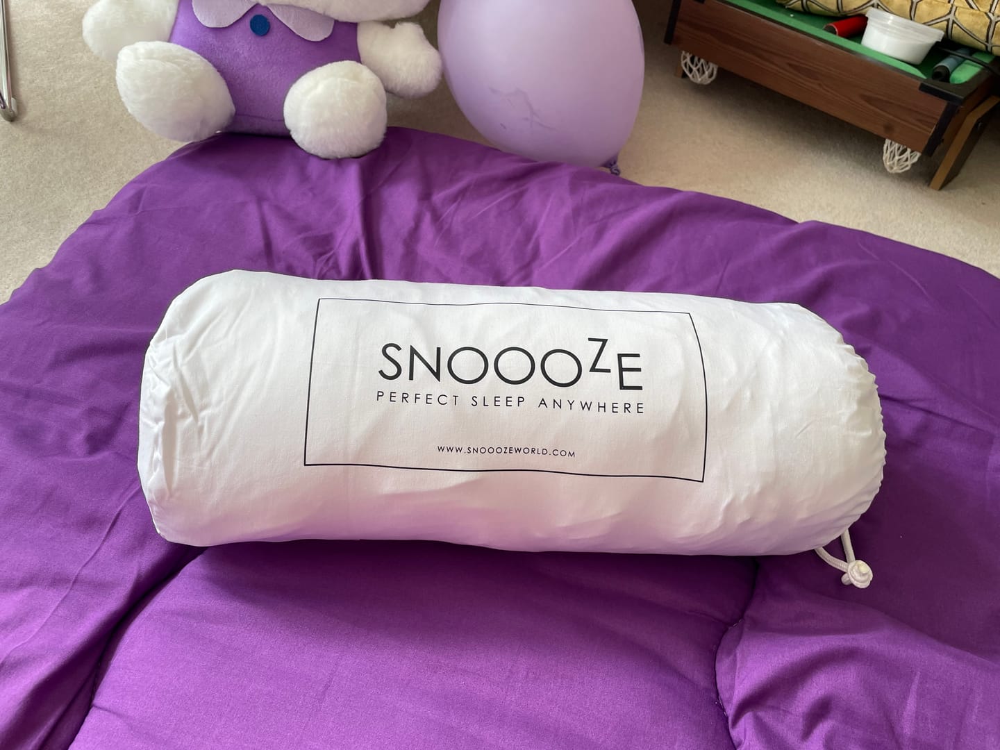 Customer photo review of Full Size Snoooze Portable Pillow