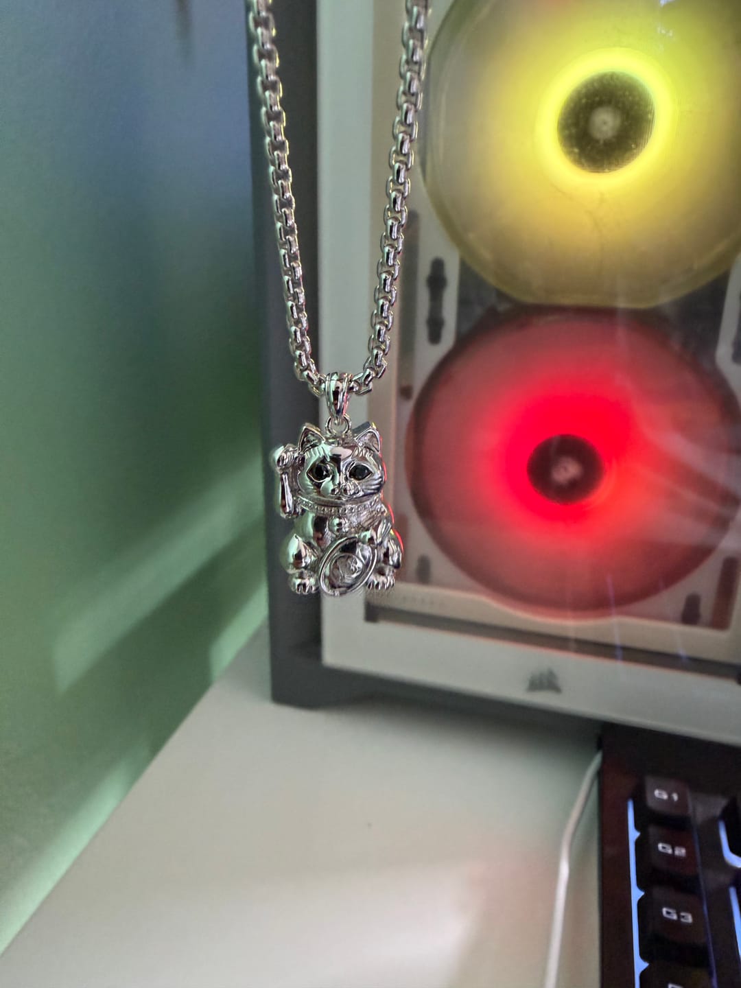 Customer photo review of Silver Maneki-neko / Lucky Cat Necklace