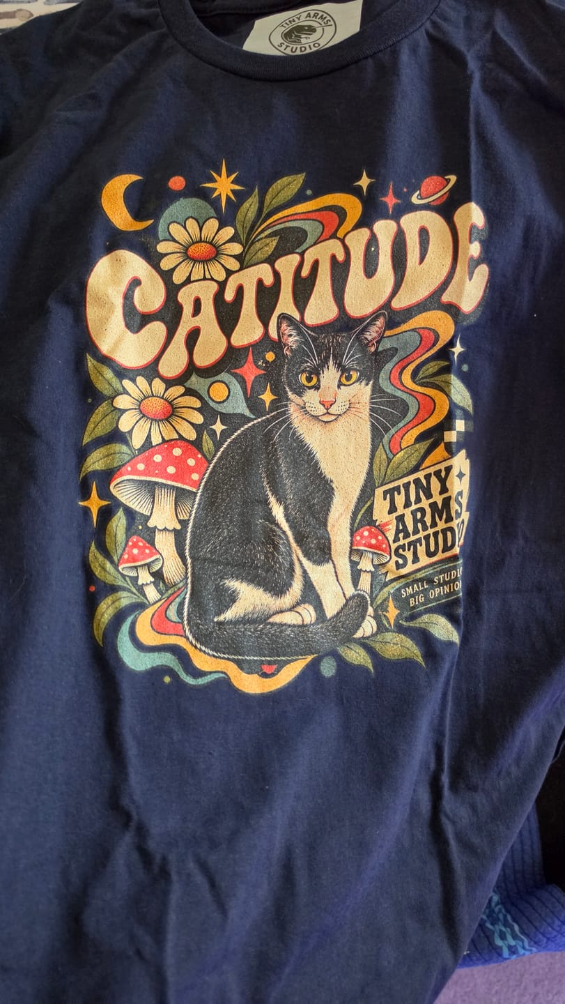 Customer photo review of Catitude Retro Tuxedo Cat Graphic Tee Vintage 70s Cosmic Botanical Design