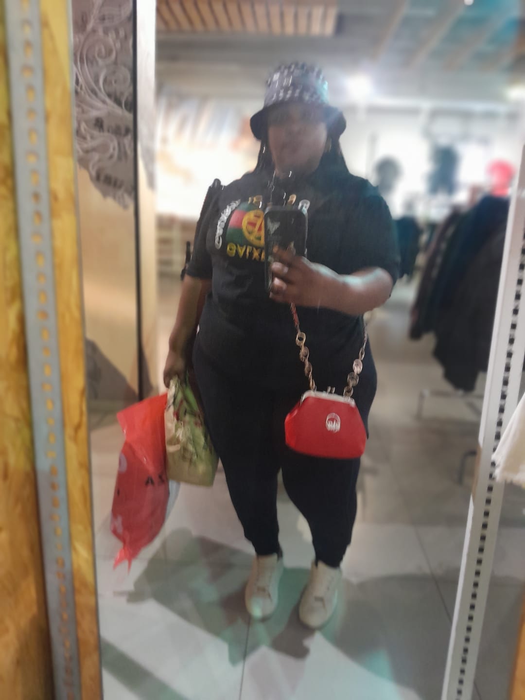 Customer photo review of ERA Mini Kisslock Chain Bag – Red