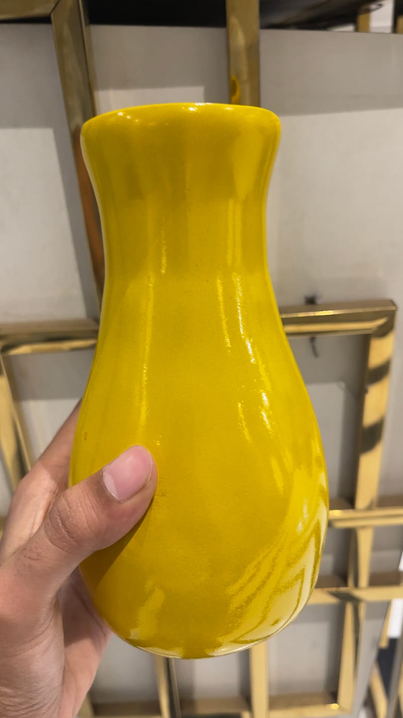 Customer photo review of Bright Yellow Decorative Resin Vase Sculpture Vastu Remedy for Positive Energy Balance and Interior Harmony for Living Room, Office and Home Decor | 6.3 x 20 cm | 230 gm