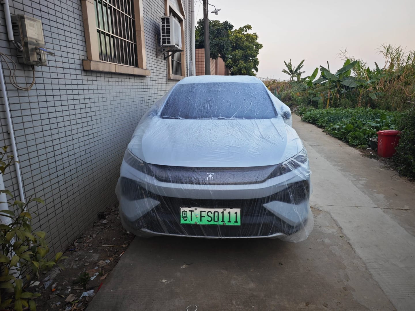 Customer photo review of All-Weather Disposable PE Car Cover – Indoor/Outdoor Dust & Rain Protection