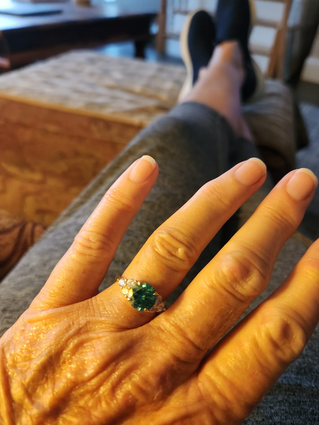 Customer photo review of Green Moissanite Side Stone Engagement Ring