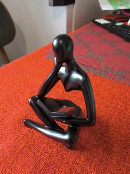 Customer photo review of Abstract Little Man Reading Book Sculpture