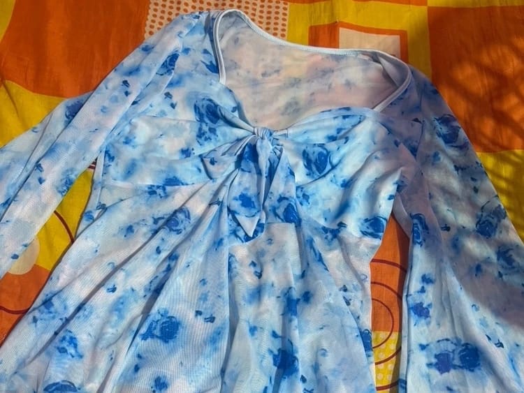 Customer photo review of Ninonine "Elowen" | Floral Mesh Bow-Front Peplum Top