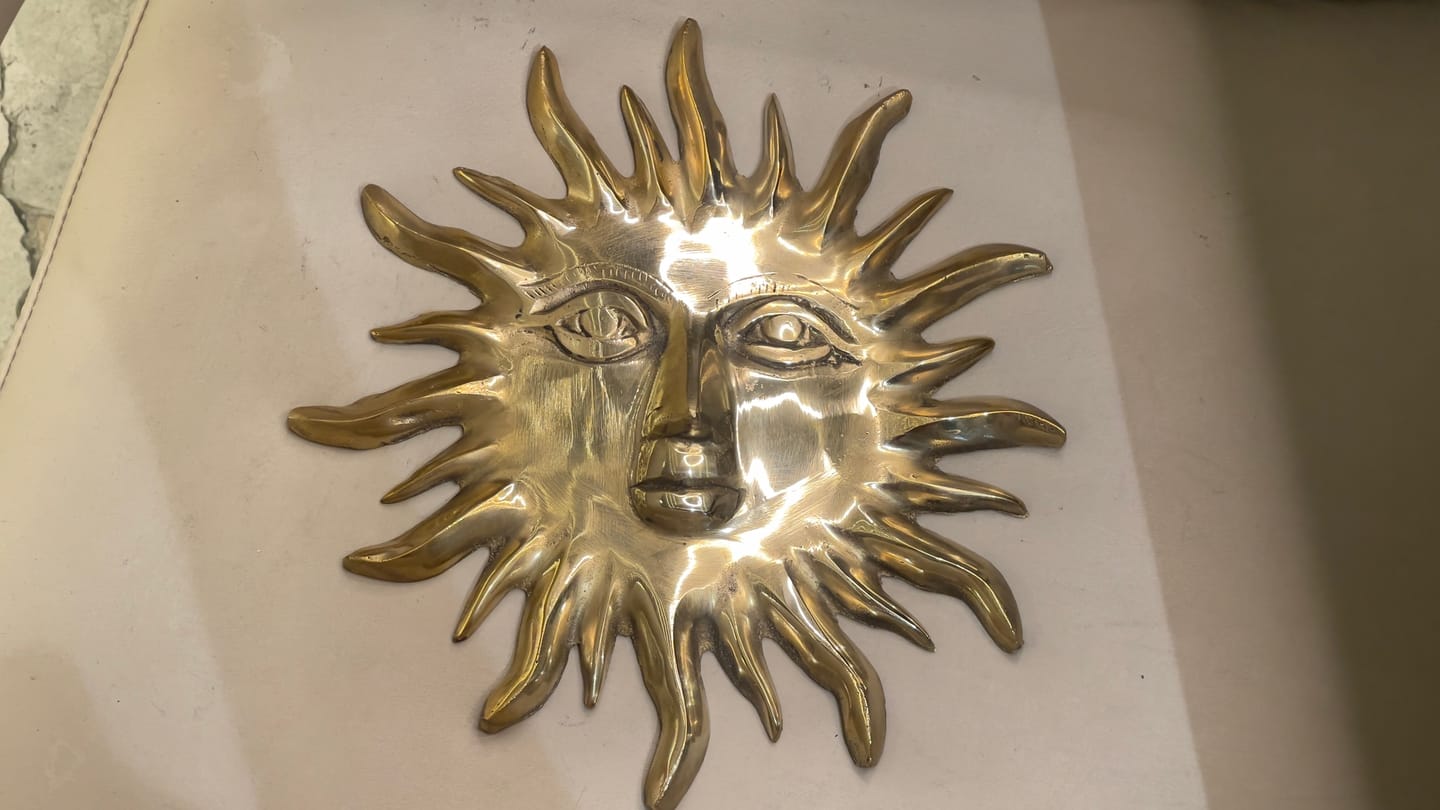 Customer photo review of Solid Brass Sun Face Wall Idol | Vastu Remedy for East Direction Prosperity & Fame | Main Door, Living Room & Office | 24 × 24 cm | 1 kg