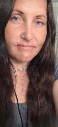 Customer's eyes wearing Hidrocor Quartz Blue Gray contact lenses that appear as a light, bright blue-gray color.