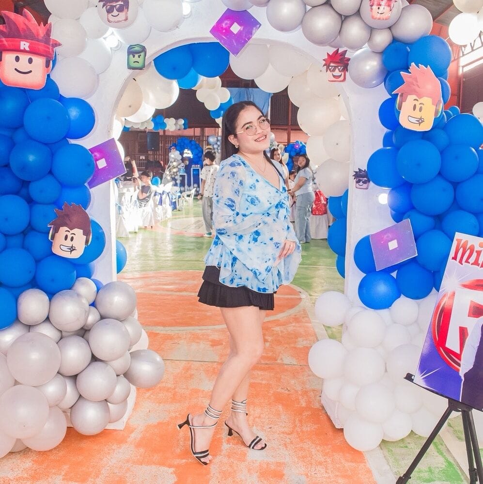 Customer photo review of Ninonine "Elowen" | Floral Mesh Bow-Front Peplum Top