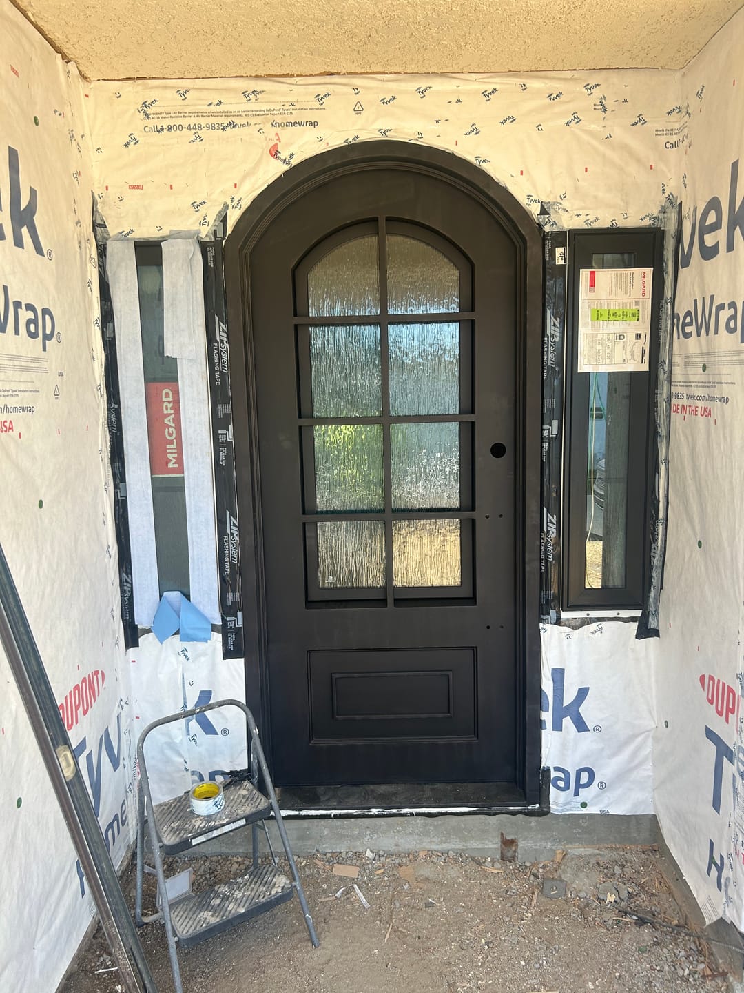Customer photo review of Anderson Model Pre Hung Single Front Entry Wrought Iron Door With Rain Glass Matt Black Finish