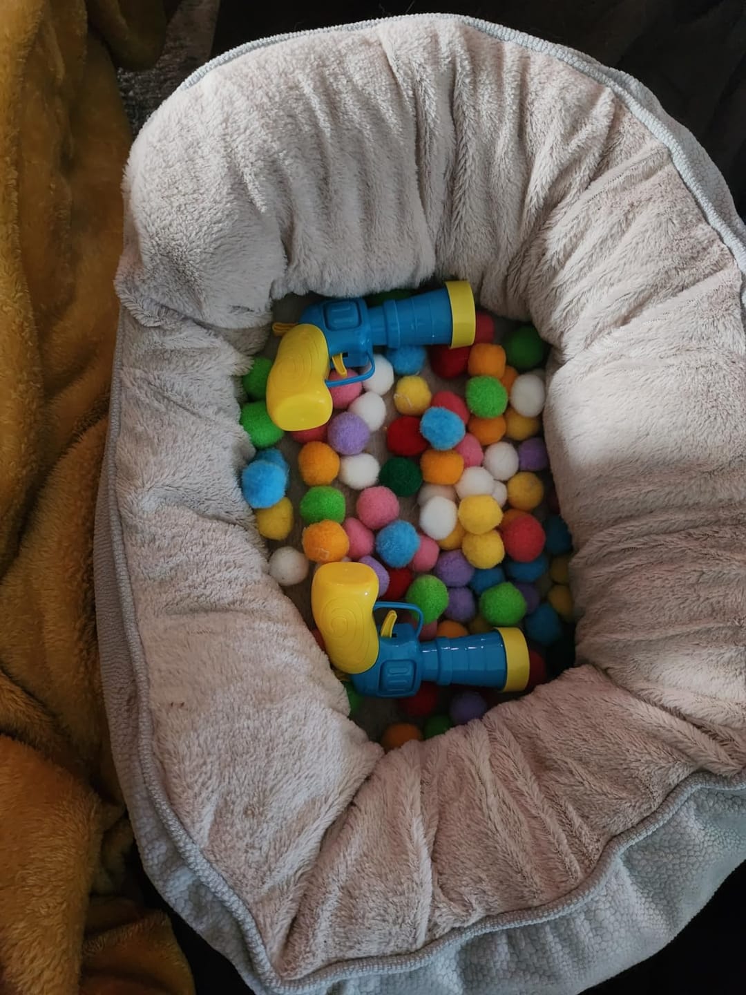 Customer photo review of Calming Puff Launcher (100 x soft fuzzy puff balls)