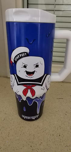 Customer's Thicc Buddy 40oz Ghostbusters mug featuring the Stay Puft Marshmallow Man character in a blue drip design.
