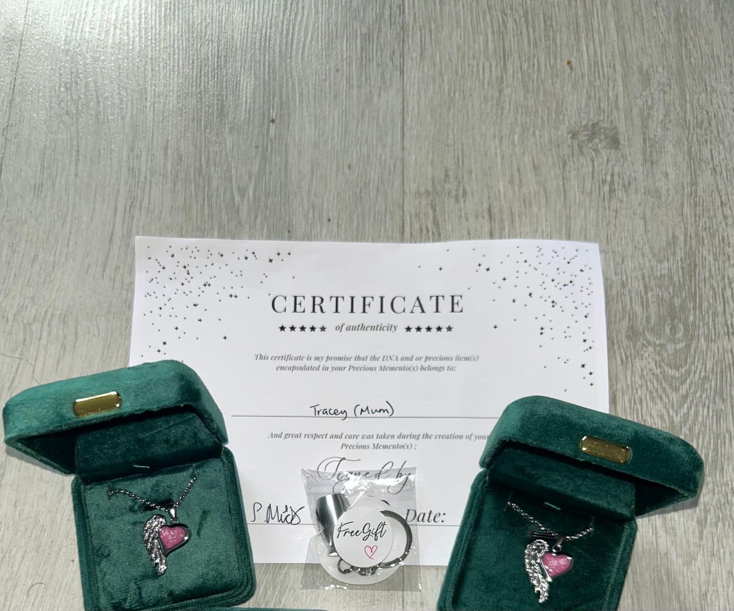 Customer photo review of Stainless Steel Angel wing Heart Keepsake Pendant